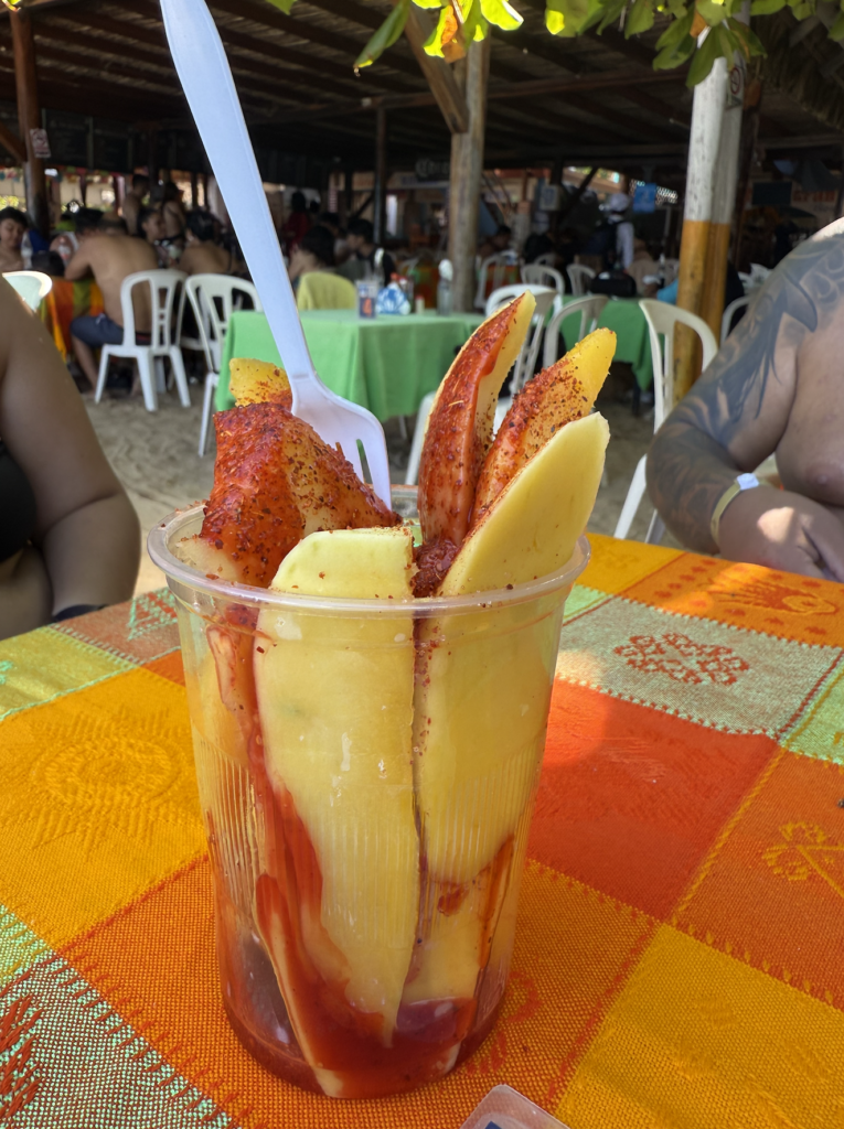 Mango with tajin from a vendor in La Entrega Restaurant in Playa de Entrega in Mexico City, Mexico